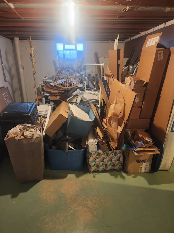 Roll-off dumpster container at job site for 2 Yard Dumpster Rental in Natchitoches